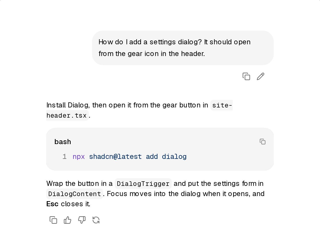 一个完整的回合:用户气泡、Markdown 回复、代码块,以及底部的操作按钮 Message:右侧用户气泡,左侧 Markdown 回复与带行号的代码块,底部是复制、赞、踩、重试按钮